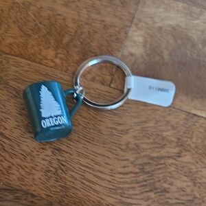 Green Oregon Mug Keychain Free With Purchase Of 15.00